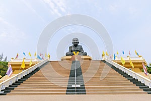 Large statue of Reverend Grandfather Thuat at Huai Mongkol Temple in Prachuap Khiri Khan Province photo