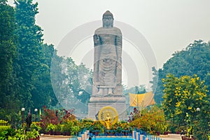 Large statue of standing Buddha in WAT THAI Temple, Sarnath Varanasi