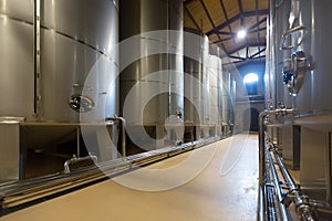 Large stell barrels in winery