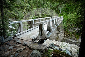 Large Stock Bridge Crosses The South Puyallup River In Mount Rainier