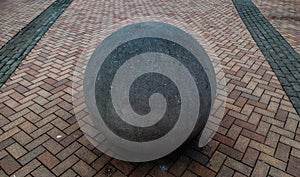 Large Stone Ball On Pavements photo