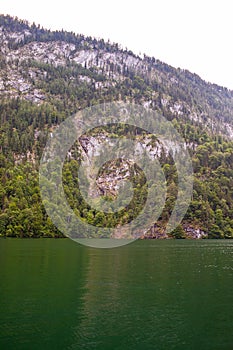 Large stone mountains in the Alps on KÃ¶nigssee Lake