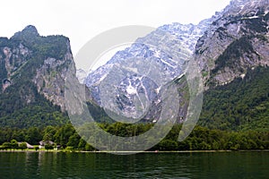 Large stone mountains in the Alps on KÃ¶nigssee Lake