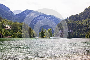 Large stone mountains in the Alps on KÃ¶nigssee Lake