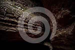 Large stones that resemble snake scales. This is Naka Cave, Bueng Kan Province.