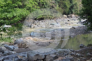 Large stones in the river in West Java in Indonesia