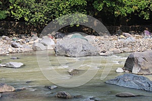 Large stones in the river in West Java in Indonesia