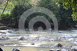 Large stones in the river in West Java in Indonesia