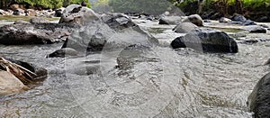 Large stones in the river in West Java in Indonesia