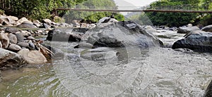 Large stones in the river in West Java in Indonesia