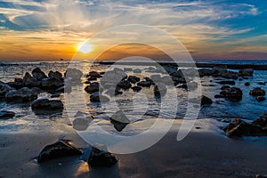 Large stones in tidal waves