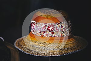 Large straw hat with colorful fabric