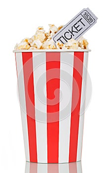 Large striped popcorn box with gray cinema ticket on white.