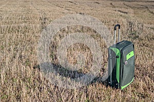 Large suitcase standing on a