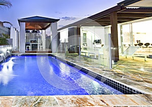 A large swimming backyard pool in modern house