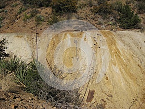 Large Tailings Pile of Abandoned Mine in Arizona Desert photo