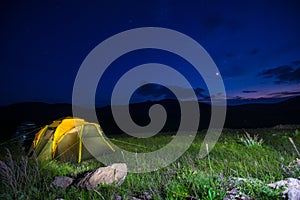 Large tent in the field under the stars, night photography, tourism concept