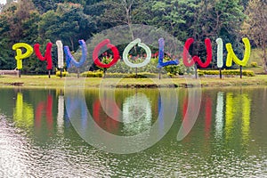 Large text with the name of the town in National Kandawgyi Botanical gardens in Pyin Oo Lwin, Myanm