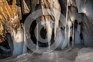 Large thick icicles on the rocks and several ice stalagmites.