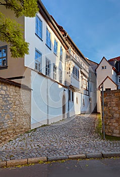 Large three-story white-washed historical timber house in Erfurt, Germany