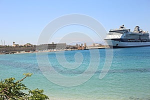 large tourist cruise liner moored seaport sunny