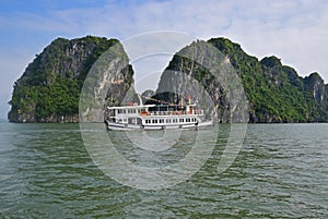 Large Tourist Junk Boat cruising without sail at Halong Bay