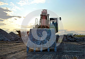 Large tracked excavator on a construction site.