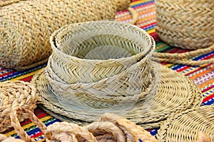 Beautiful handmade straw hat on the market stall photo