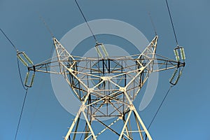 Large transmission towers at sunset