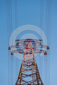 Large transmission towers at sunset