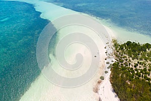 Large tropical island white sandy beach, view from above. Seascape, nature of the Philippine Islands