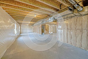 Large unfinished basement with woodframes and wall insulation