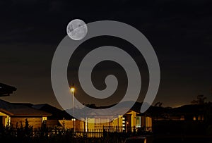 Large urban moon rise in Christchurch, New