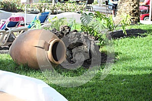 A large urn in a garden