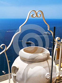 Large Vase with backgroundof the Fariglioni Rocks on the island of Capri in Italy