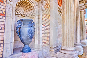 The large vase in the niche of the main Gate portal of Varkert Bazar complex in Budapest, Hungary