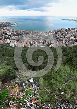 Large view of Jounieh, Lebanon,  from  the edge of the road in the mountain above the city with all the trashes left there by photo