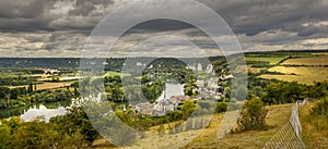 Large view by wide angle on small typical village close to the Seine River near Rouen in France. Nice countryside panorama