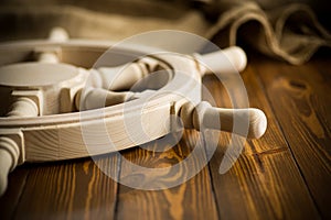 Large vintage steering wheel on a wooden table