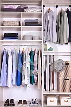 Large wardrobe with different clothes, home stuff