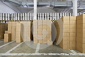 Large warehouse with beer kegs and cardboard boxes in stock brewery Ochakovo