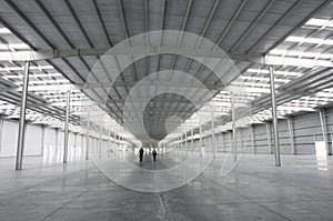 Large warehouse for industrial purposes illuminated by solar light