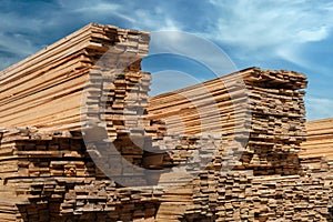 A large warehouse of wooden boards for construction