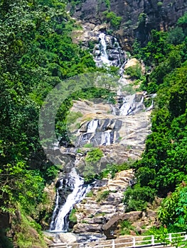 Large waterfalls in tropical forest at Nuwara Eliya, Sri Lanka