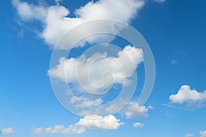 Large white clouds on a blue sky. Clear day. Background, blank