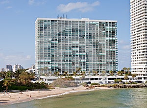 Large White Coastal Condo Building