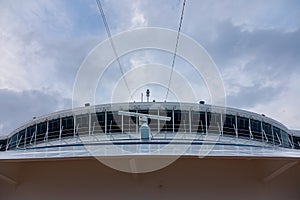 Large white cruise ship in the port of Savona, Italy