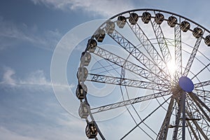 Large white observation wheel on Norfolk seaside town