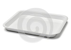 A large, white, rectangular, empty baking tray on a white background