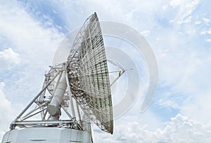 Large white satellite dishes in communication antenna center station